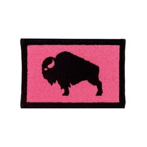 An embroidered 2"X 3" patch that has an American Bison, Buffalo, Ox, bull, with a velcro hook and loop backing. The Bison is black with a hope pink background and black boarder. Tactical gear accessories. Very Popular.
