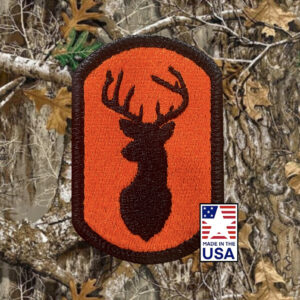 3 x 2 embroidered patch with deer on it in safety orange. Velcro back for hunting gear.