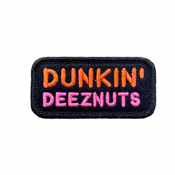 Vibrant 1.5x3 inch Dunkin' Deeznutz Morale Patch with hook and loop back, showcasing humorous design - ideal for backpack customization.