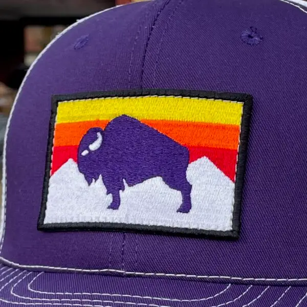 Image of a Purple Snapback Cap with American Bison Sunset Patch. USA-made, athletic fit, adjustable, perfect for active and patriotic styles.