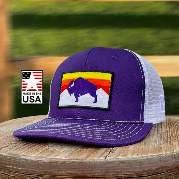 Image of a Purple Snapback Cap with American Bison Sunset Patch. USA-made, athletic fit, adjustable, perfect for active and patriotic styles.