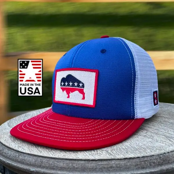 American Bison Snapback Hat in Red, White, and Blue. Striking royal blue color, adjustable snapback closure, embroidered majestic bison patch.
