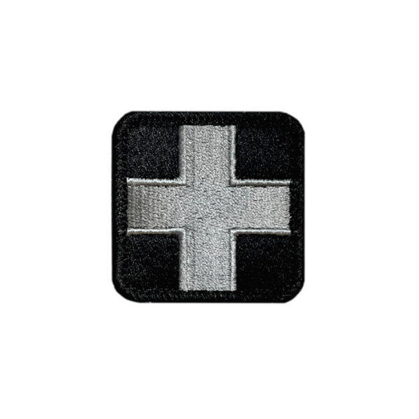 Embroidered sliver gray and black medical patch with a 2x2 inch size and hook backing.